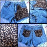 Short tamanho 44 com estampa de onça.